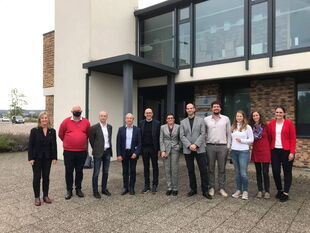 Frédéric Bierry, Thomas Zeller, Daniel Adrian und Pascale Schmidiger mit den Geschäftsstellen vom TEB und Infobest